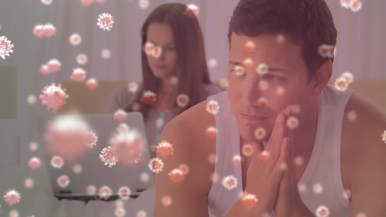 백그라운드에서 싸우는 커플을 상대로 움직이는 코로나19 세포의 디지털 복합 비디오