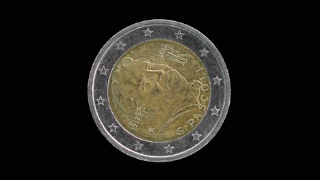 Italy 2012 2 euro obverse commemorating 100th anniversary Giovanni Pascoli rotating on black background
