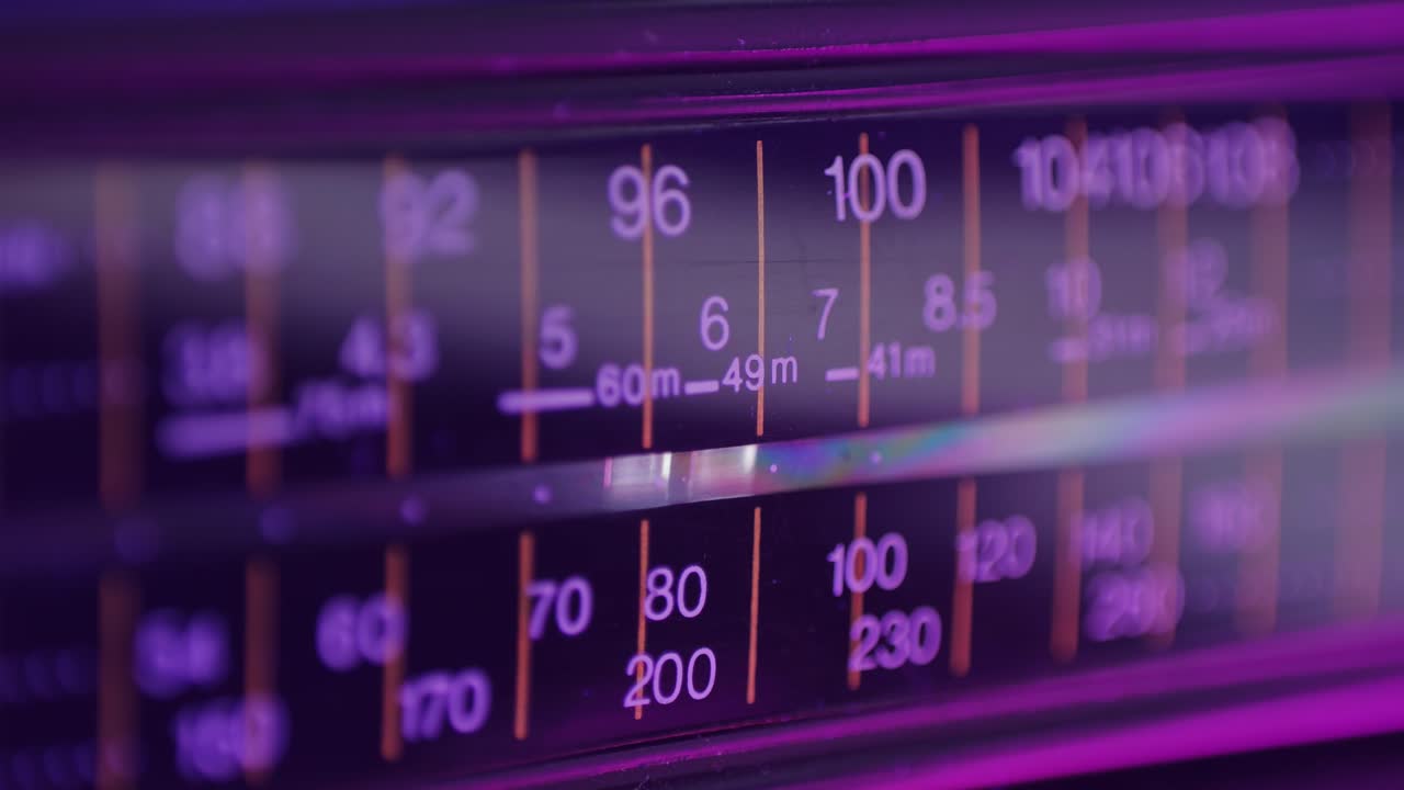 Retro radio tape recorder close-up. Listening to music, old radio boombox player, searching channel.