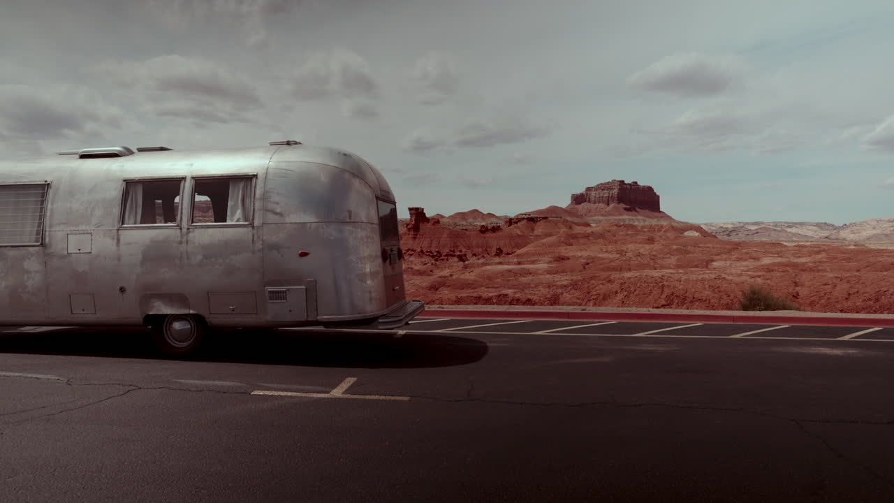 Vintage Camper in a Desert Landscape
