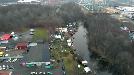 wide aerial shot of tiny inlet and surrounding landscpe