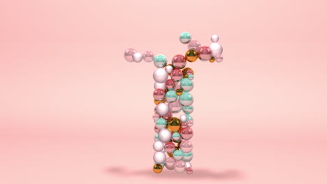 letra hecha de cuentas, bolas de vidrio, perlas pastel, joyas de cristal y oro