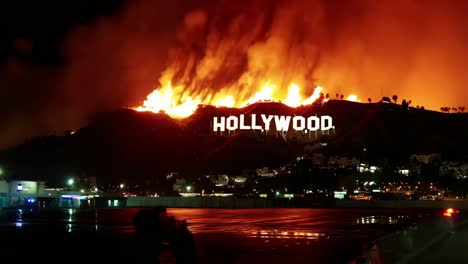 hollywood sign during wildfire at night