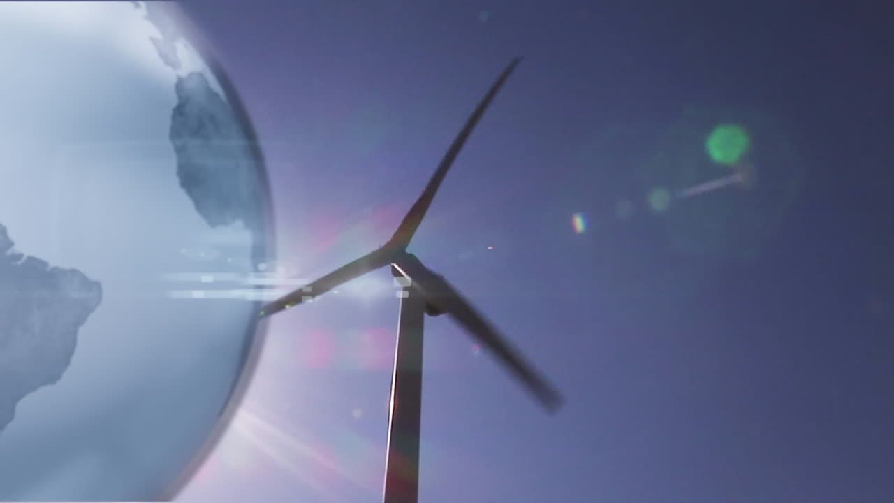 animación del globo sobre la turbina eólica contra el cielo azul