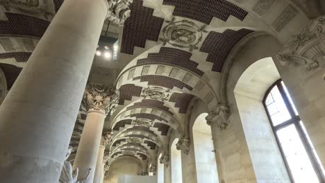 visitors admire sculptures and architecture