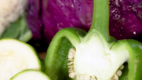 a vibrant assortment of fresh vegetables including peppers, tomatoes, and cabbage, showcasing natural colors and textures