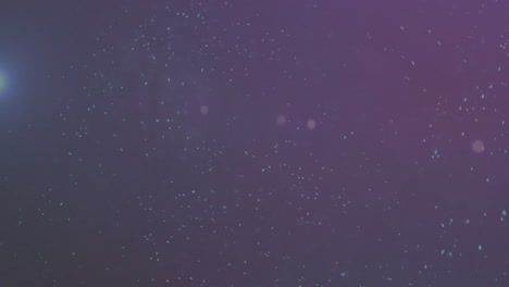 animación de manchas púrpuras sobre un fondo negro