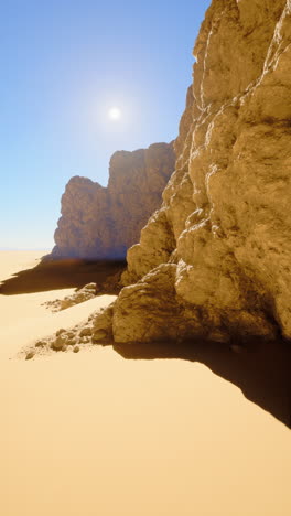 desert landscape with rock formations and a blue sky