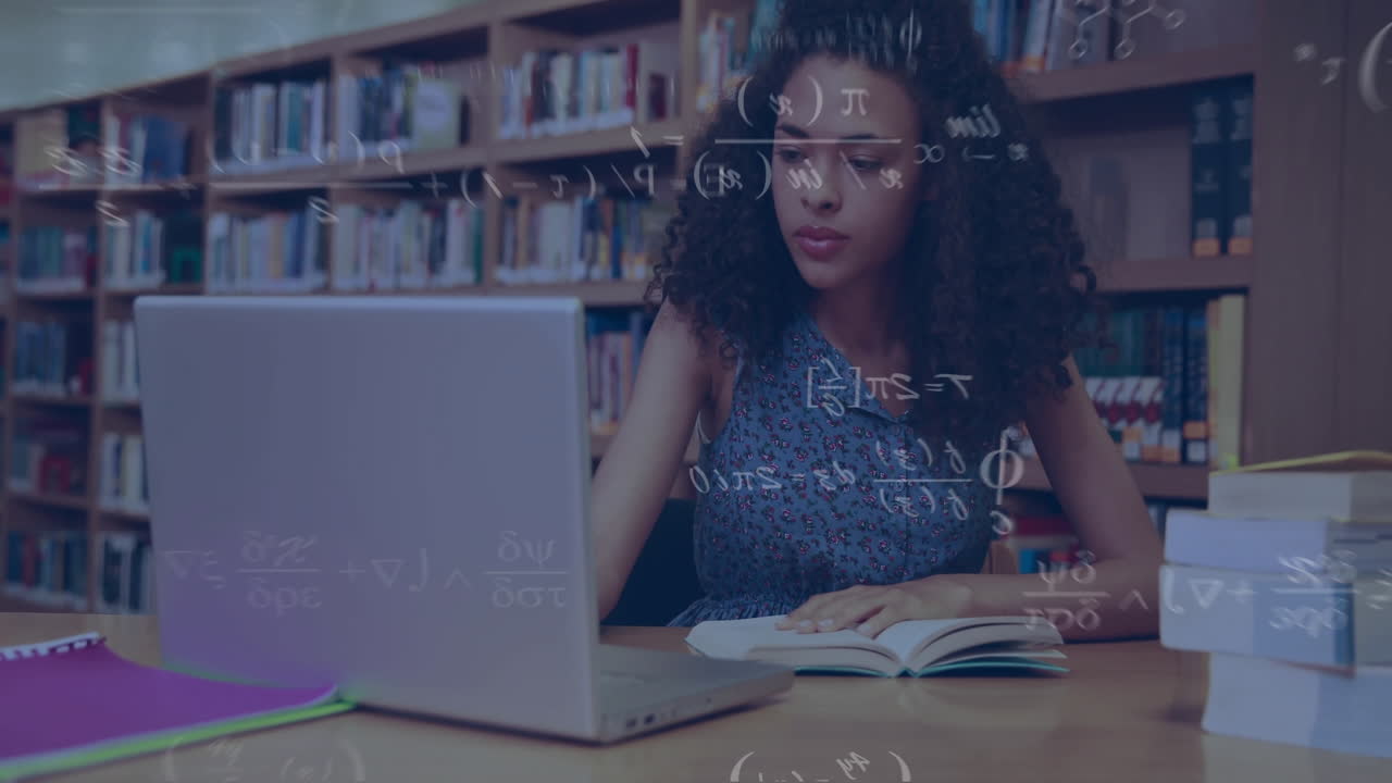 Animation of mathematical equations over happy biracial female student using laptop in library