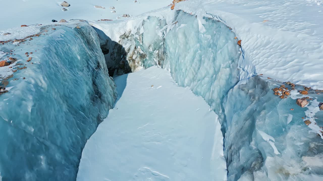Pristine permafrost environment, tranquil remote rugged icy ridge, aerial