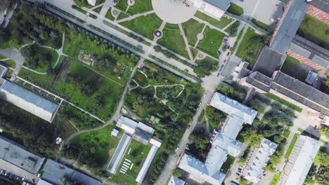 aerial view of a city campus with gardens and parks