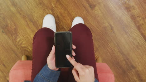 caucasian woman using her phone