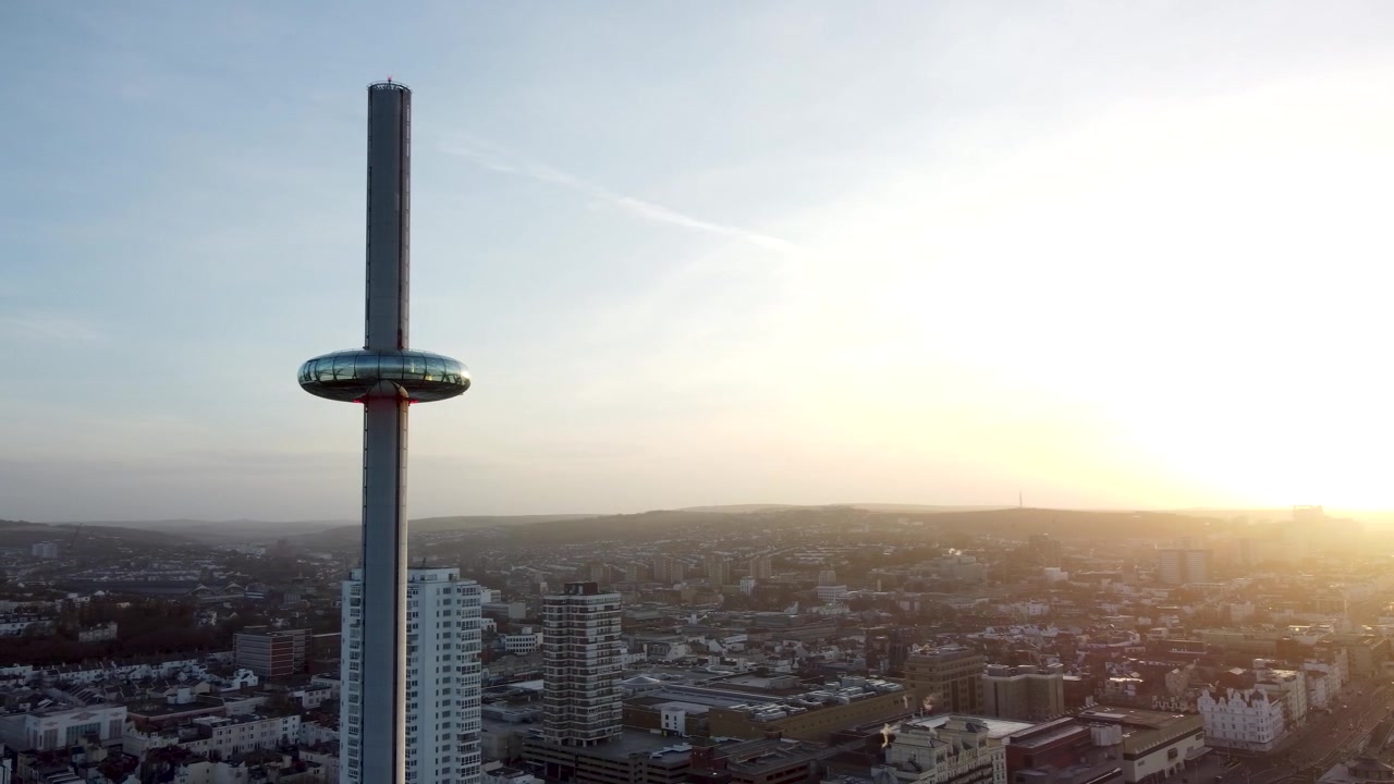 Drone shot close up rotation of i360 in Brighton at sunrise