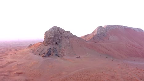 4k drone footage, aerial view of fossil rocks plateau in meliha desert with sand ripples, geological landscape of the sphinx in sand dunes desert in the united arab emirates, drone videos