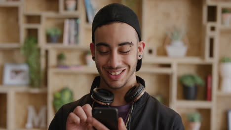 portrait-teenage-hispanic-man-using-samrtphone-texting-browsing-online-sending-messages-enjoying-mobile-communication-satisfaction-wearing-trendy-fashion