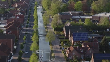 Small-City-in-north-germany-with-a-canal-system-and-curch-drone-shot