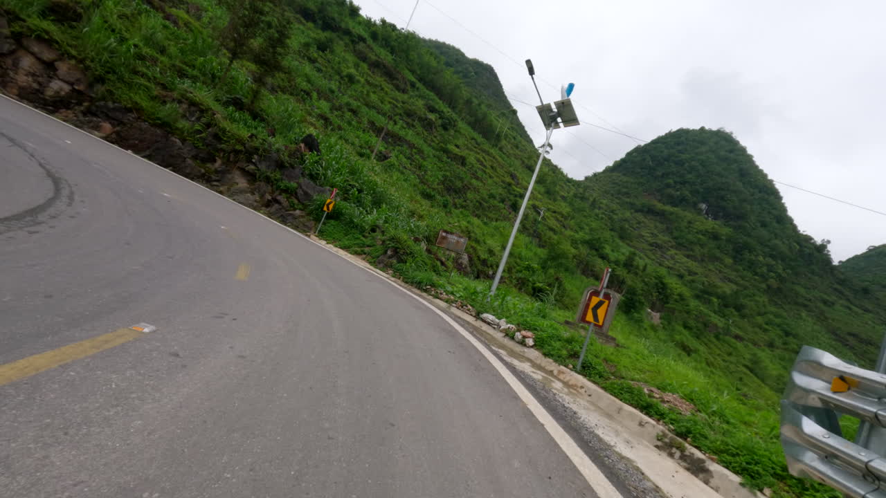 POV Shot Of Driving winding roads of Ha Giang Loop In Vietnam