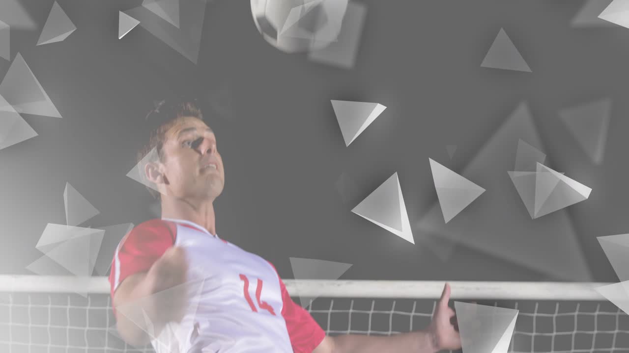 Male soccer player heading incoming ball amid animated triangles driving sports training