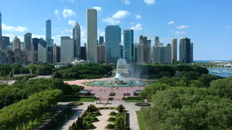 beautiful fountain and relaxing day in the park with buildings, day light