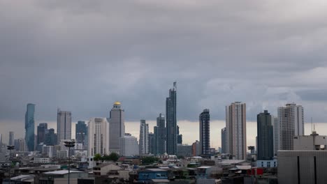 heavy rain cloud storm over city skyline in bangkok thailand