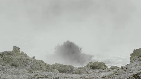 Boiling-hot-geothermal-volcanic-mud-pool,-closeup-shot-steamy-lake-bubbling-mud-and-steam