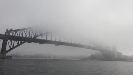 famous sydney harbour bridge during hazy morning in australia