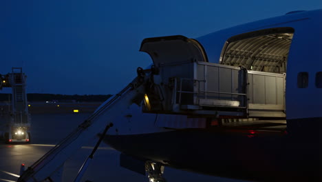Airplane Cargo Hold Operations at Night