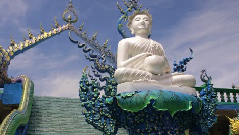 serene white buddhist statue at chonburi's viewpoint