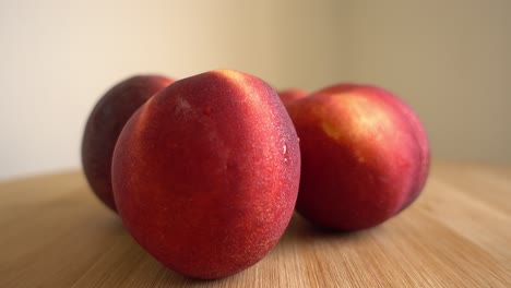 freshly picked ripe peaches rotating