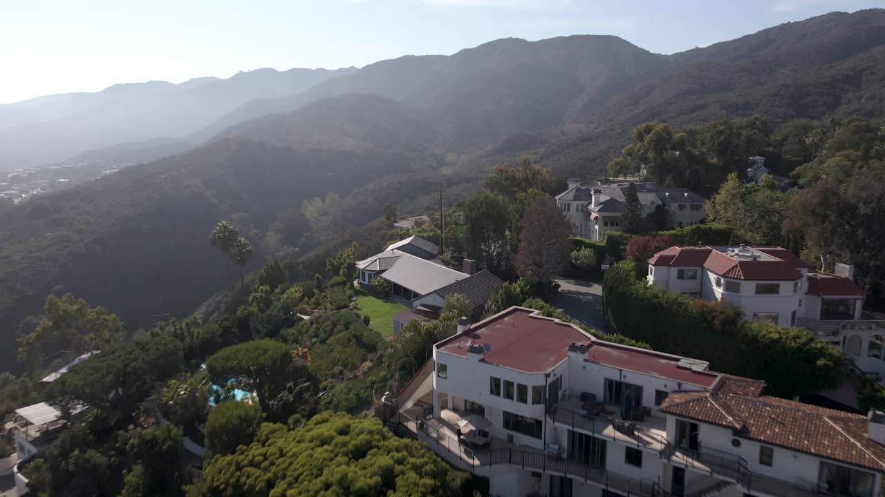 Aerial fly over mansions in Malibu