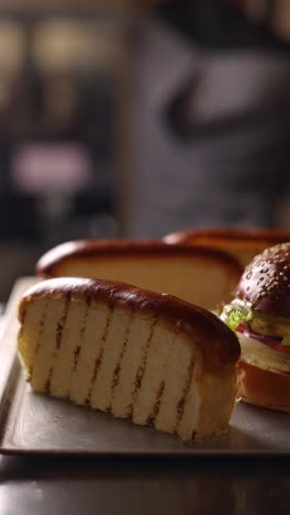 preparing burgers and hot dogs