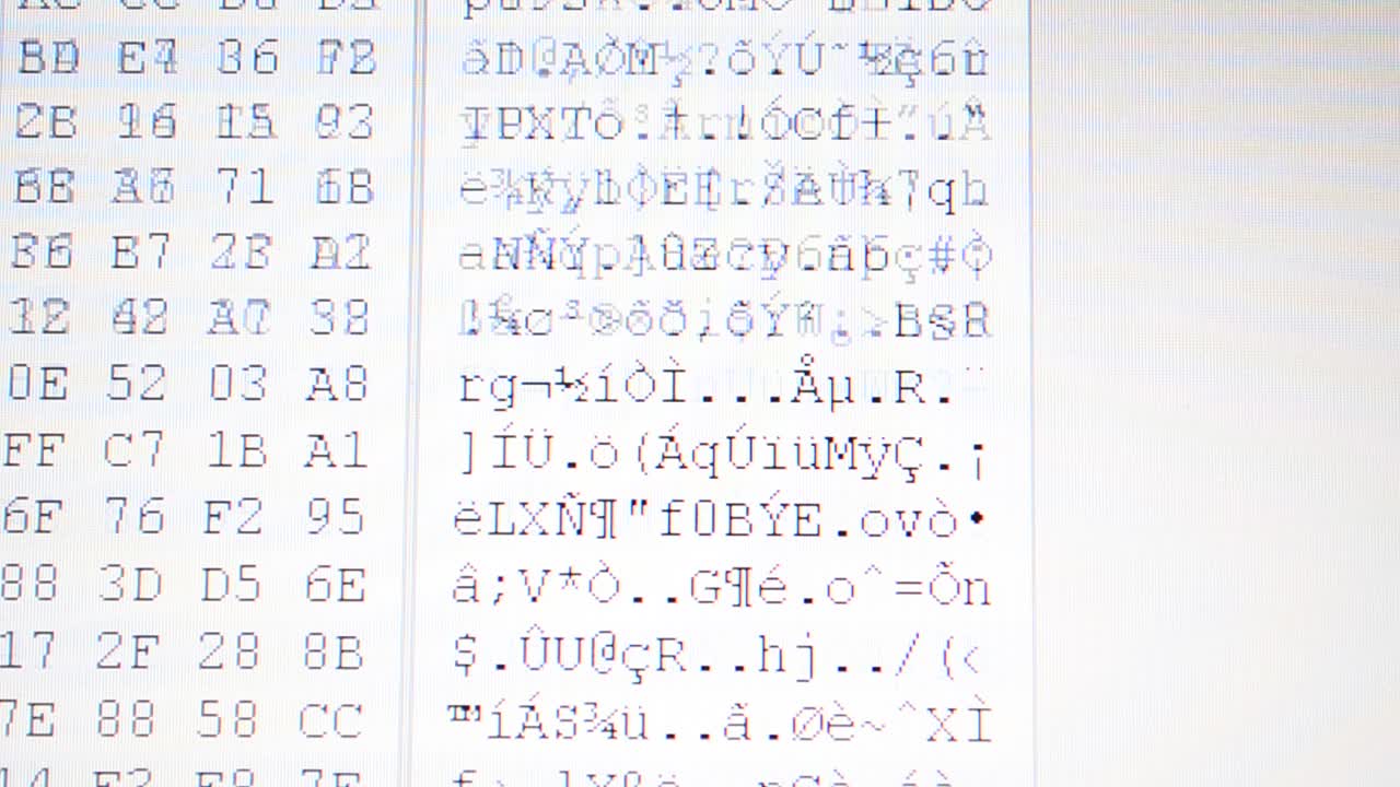 The ciphered file. Hexadecimal program code on screen. Animated background of moving binary code numbers. The movement of a code binary in the form of the table