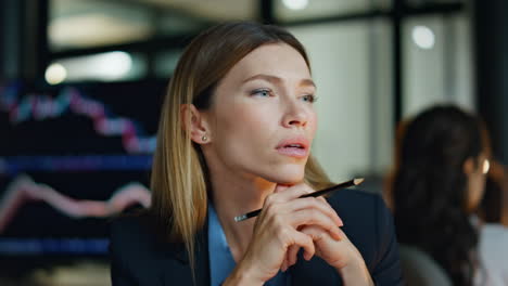 closeup invest manager contemplating sales business. pensive woman look solution