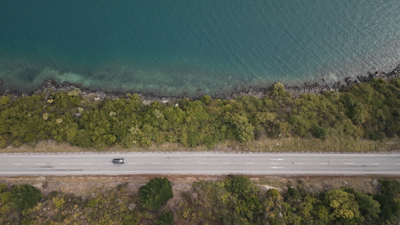 Aerial View of a Road by a Lakeside