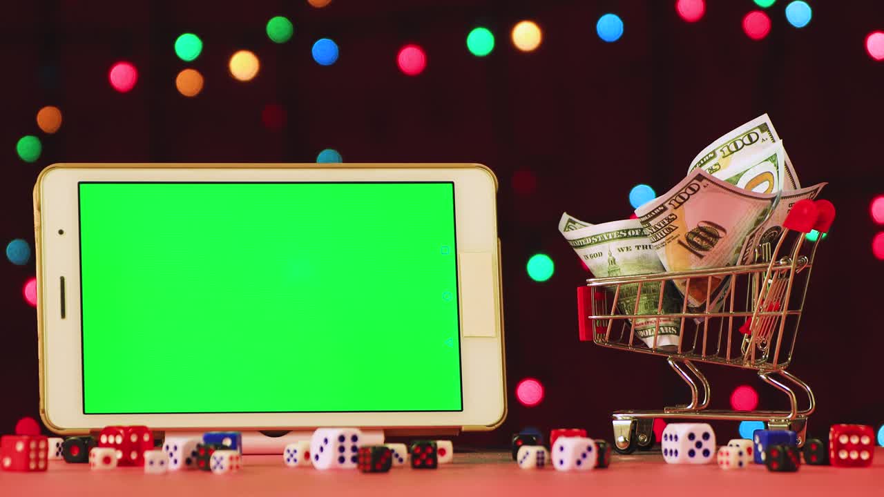 새해의 비디오 스크린 세이버 태블릿과 크로마 키와 달러 바구니