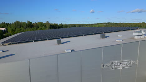 large array of solar panels on the roof of a building