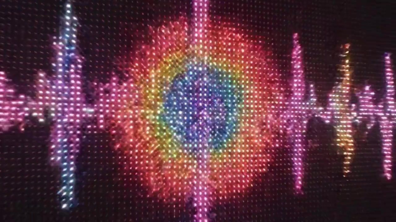 A Mesmerizing Display of Colorful Light Patterns Transitioning from a Dynamic Cosmic Burst to a Vibrant Floral Design in an Impressive Visual Experience