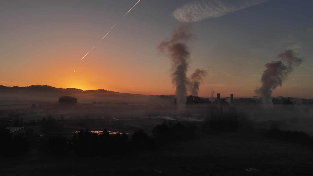 Industrial pollution in the morning sunrise light
