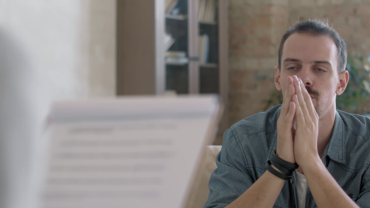 Upset Male Patient Sharing Problems with Therapist