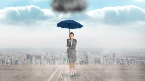composite image of businesswoman holding an umbrella