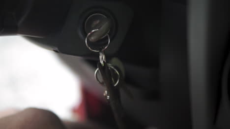 car starting with ignition key close up