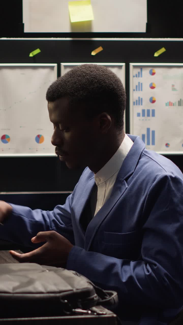 Professional African American businessman working in office