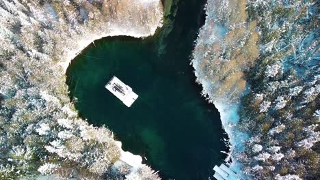aerial spring flyover - kitch-iti-kipi michigan