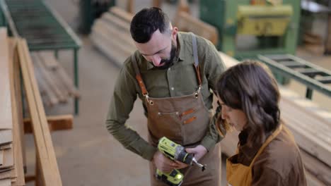 teamwork of creative carpentry workers at the manufacturing