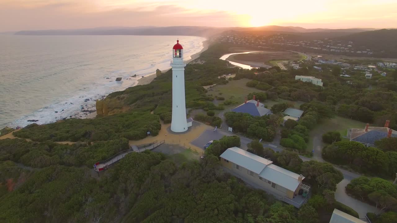 Lighthouse on the Great Ocean Road in Australia , drone at sunset.