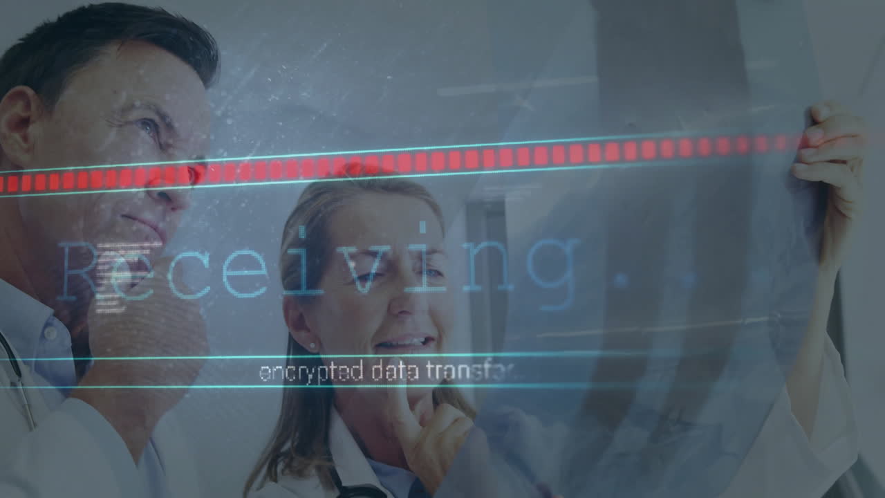 Senior female doctor reviewing X-ray film in medical lab, showing encrypted data transfer progress