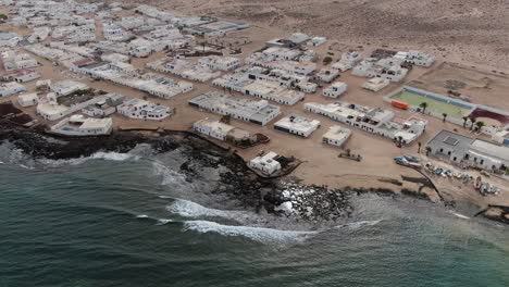 aerial view of ocean waves on coastline of la graciosa, canary islands, spain