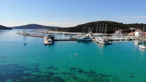 A-drone-video-of-remote-controlled-sail-boat-championship-in-Rogoznica,-Croatia