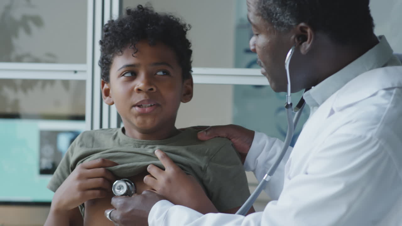 Doctor examining a child with a stethoscope