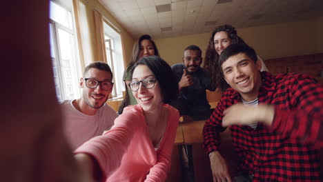 students taking a selfie in a classroom